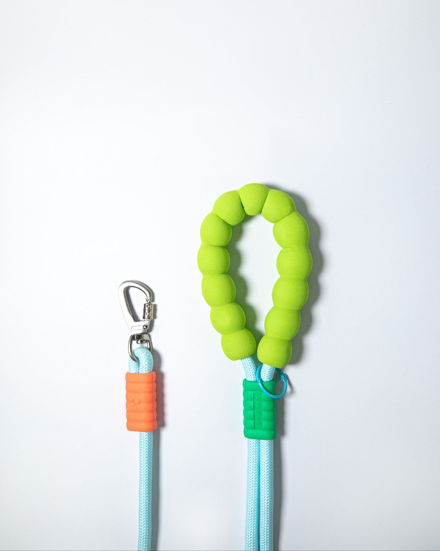 Light blue rope dog leash with bright green foam handle and secure metal clasp – stylish, durable leash for pet walking and training