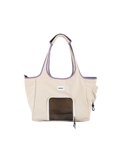 Beige pet carrier bag with a clear front panel on a white background