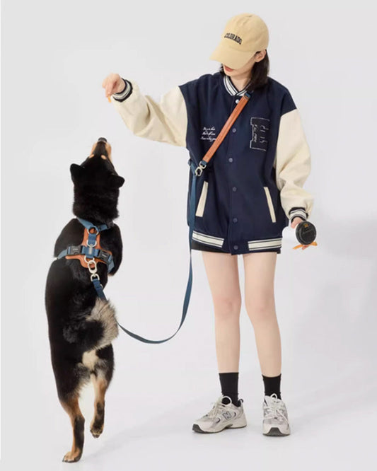 Adjustable navy blue dog harness with vegan leather padded chest support, D-ring in front and back. no-pull design for medium to large dogs
