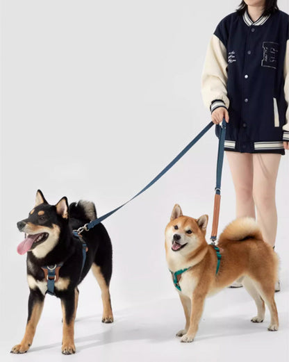 Adjustable navy blue dog harness with vegan leather padded chest support, D-ring in front and back. no-pull design for medium to large dogs