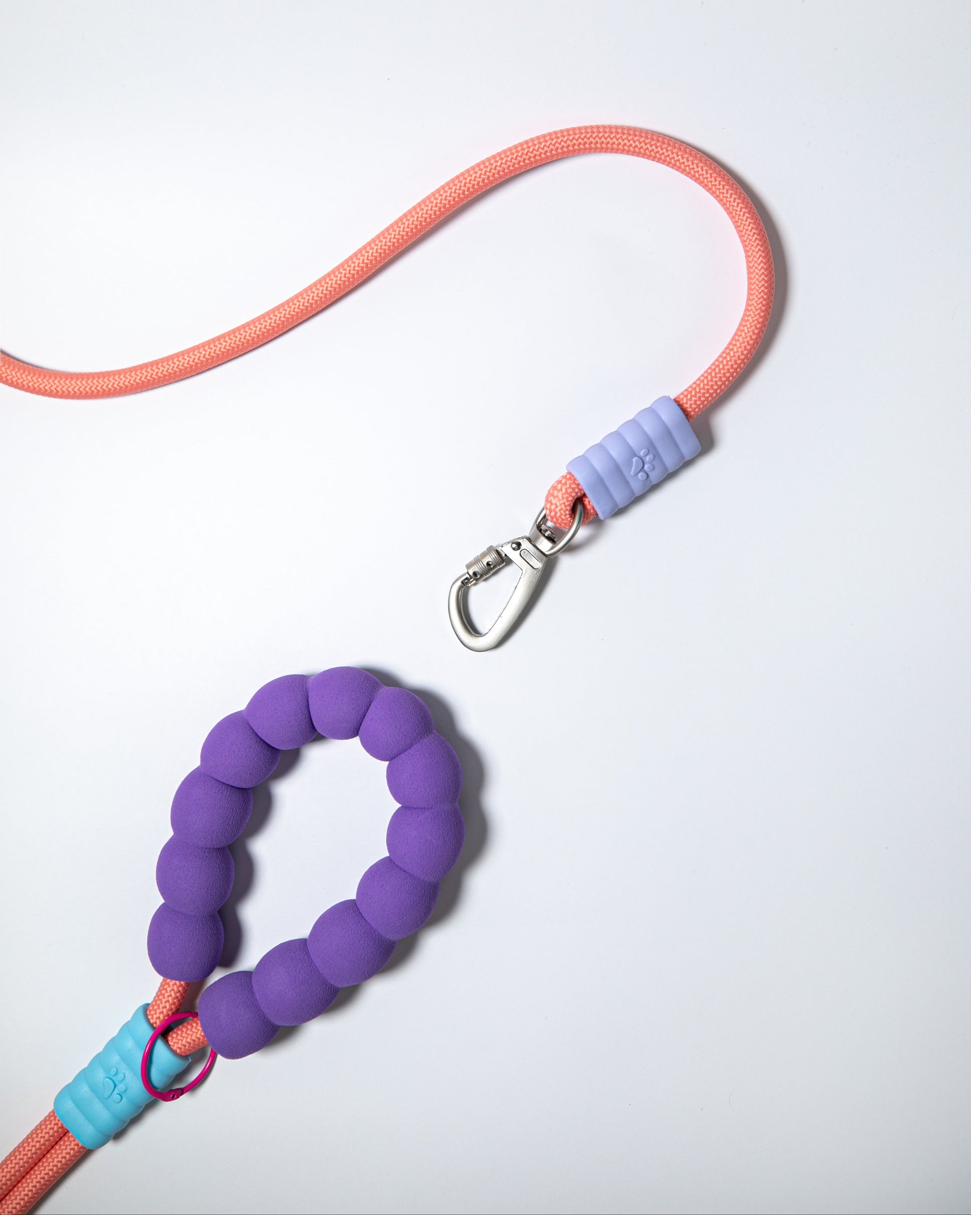 Coral pink rope dog leash with soft purple handle and safety clip – stylish durable lead for small to medium dogs